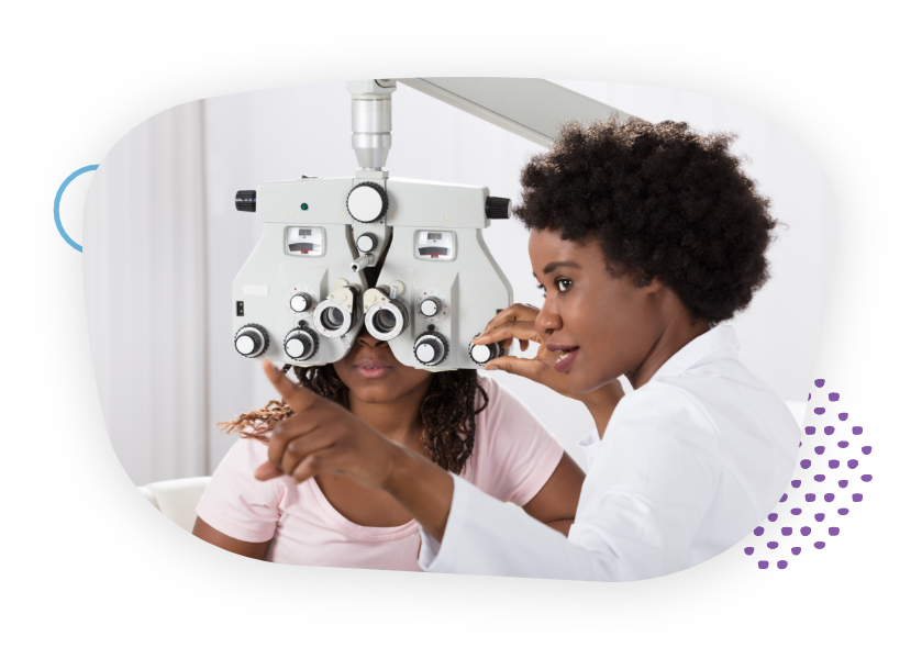 doctor performing eye exam