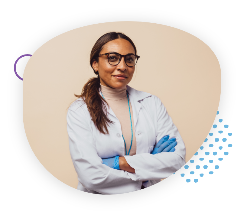 woman in white lab coat wearing glasses