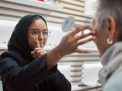 Woman receiving an eye exam